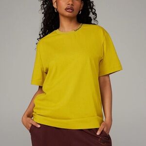 SAVAGE X FENTY GRILLE GRAPHIC TEE - SWEET OLIVE YELLOW